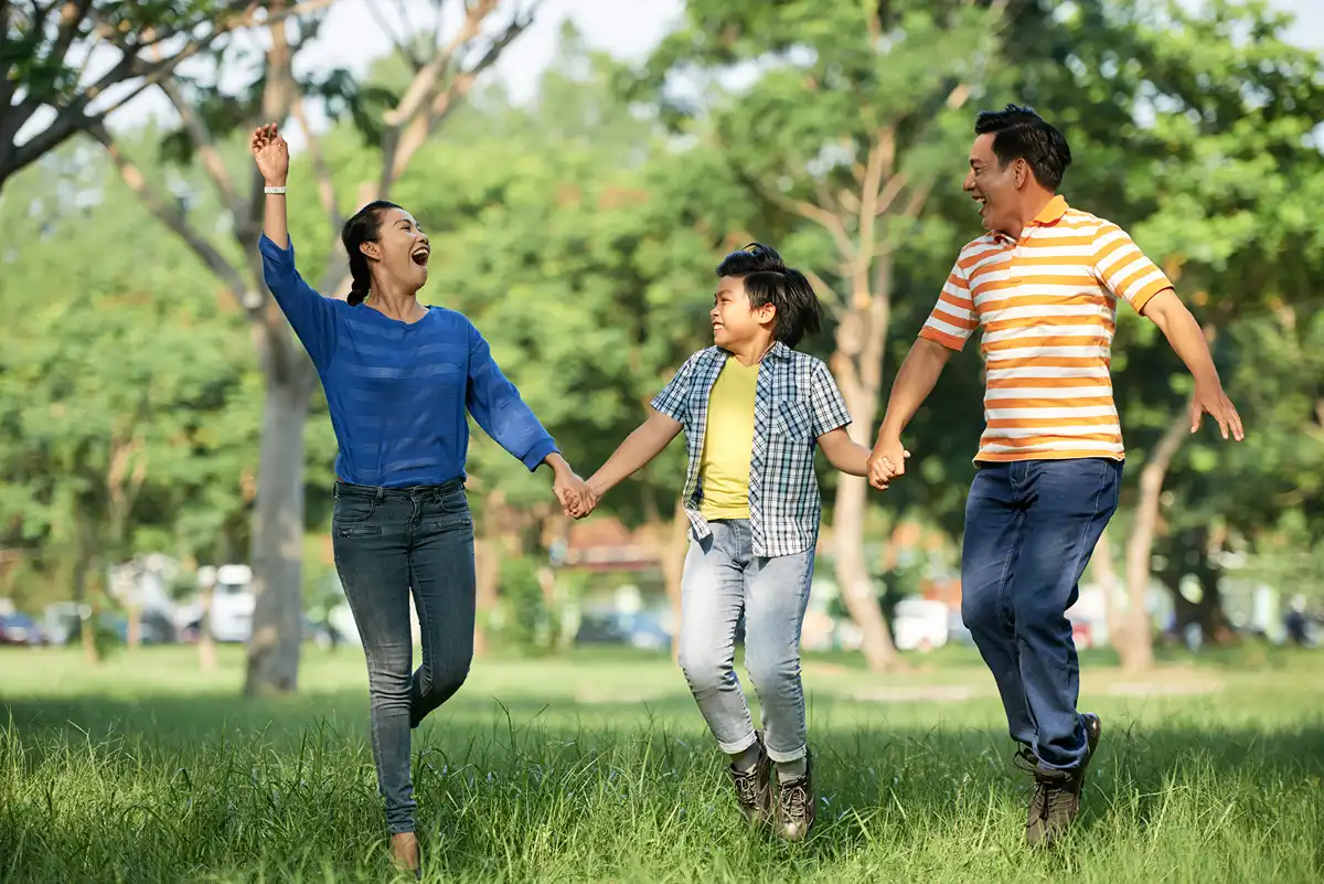 adorable-family-having-fun-park