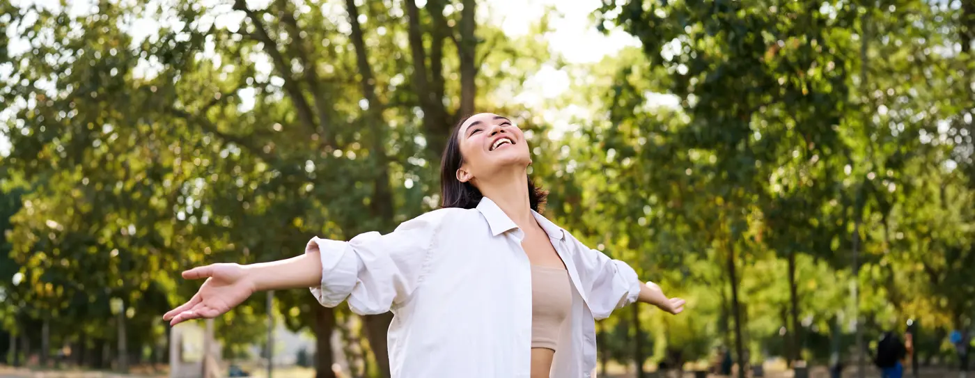 portrait-carefree-young-asian-woman-dancing-park-alone-enjoying-freedom-smiling-with-joy banner